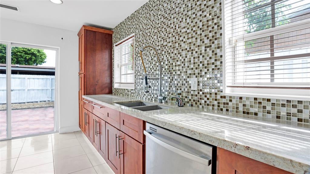 8241 Southwest 3rd Court North Lauderdale, FL 33068 - Photo 7 of 30 a bathroom with a sink and a shower