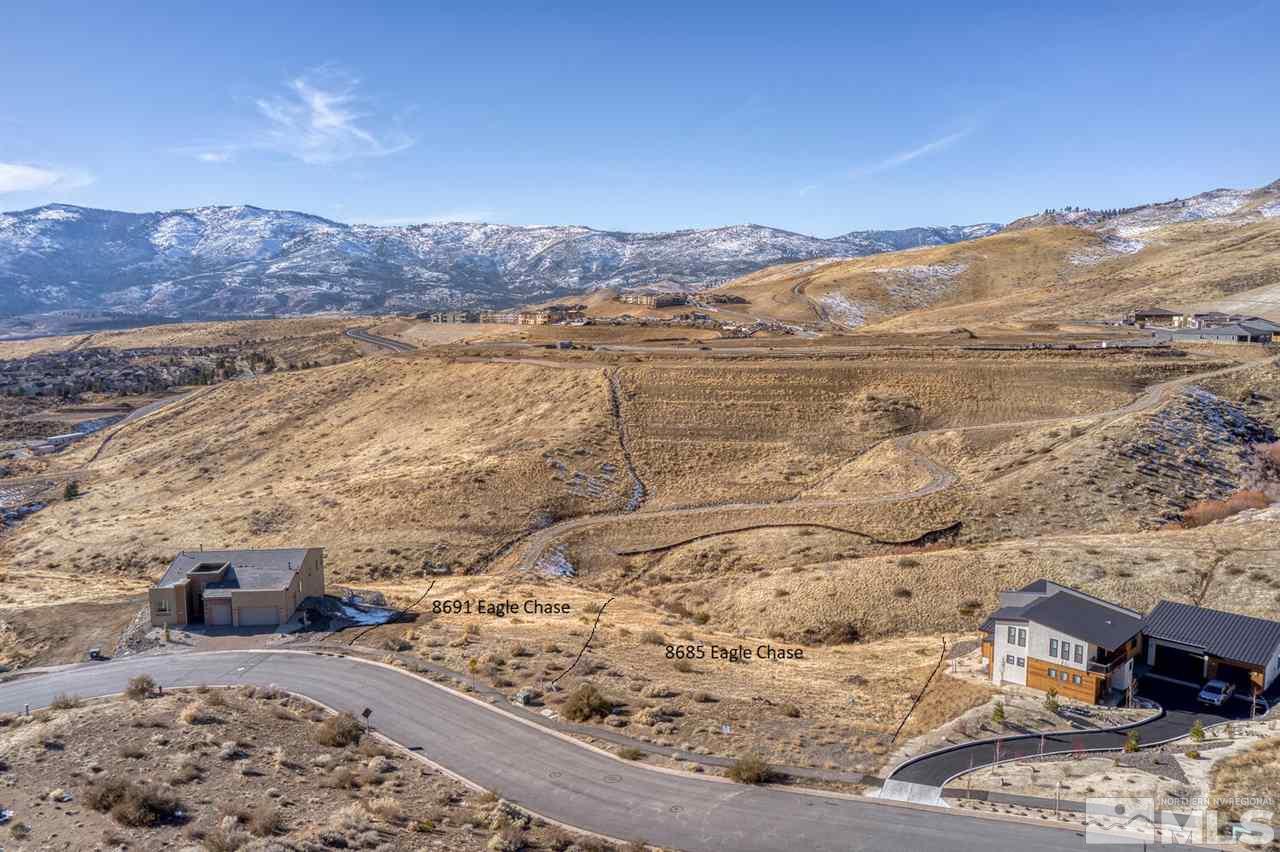 8691 Eagle Chase Trail Reno, NV 89523 - Photo 15 of 17 a view of a backyard with wooden floor and a mountain view