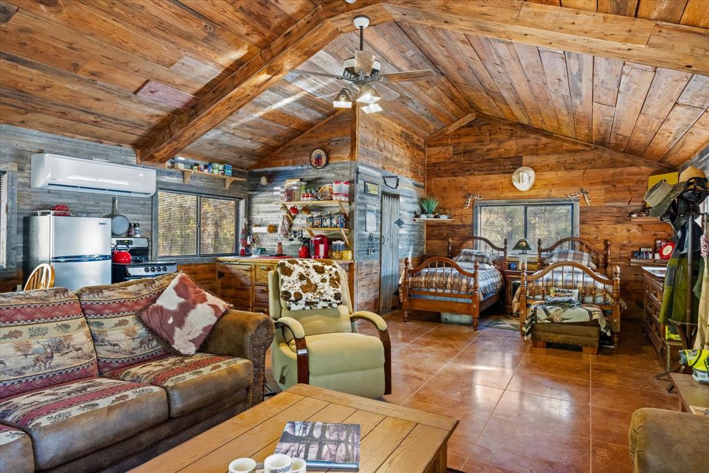 2500 Leech Road Poolville, TX 76487 - Photo 13 of 40 a view of livingroom with furniture and a couch