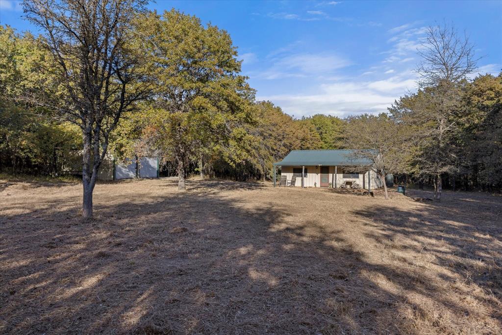 2500 Leech Road Poolville, TX 76487 - Photo 25 of 40 a view of outdoor space with trees