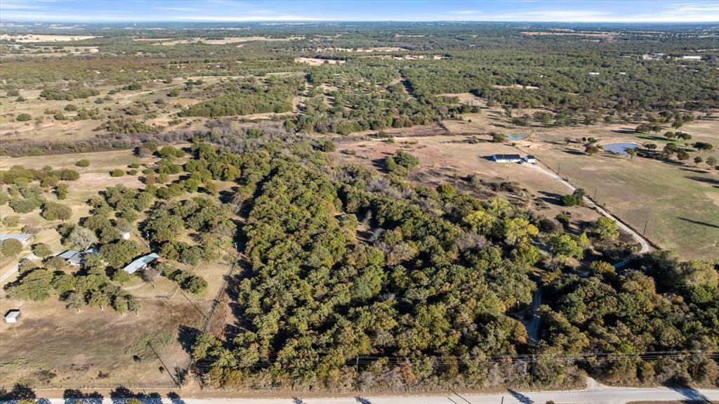 2500 Leech Road Poolville, TX 76487 - Photo 30 of 40 an aerial view of residential houses with outdoor space