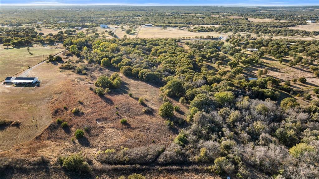 2500 Leech Road Poolville, TX 76487 - Photo 32 of 40 an aerial view of residential houses with outdoor space