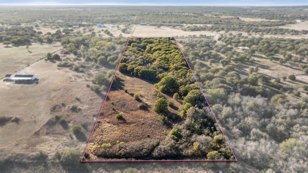 2500 Leech Road Poolville, TX 76487 - Photo 5 of 40 an aerial view of mountain with beach