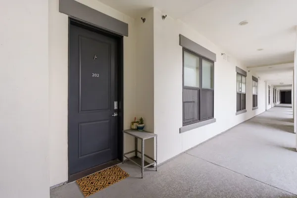 a view of livingroom with furniture and windows