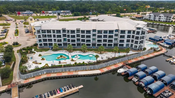 a view of swimming pool from a balcony
