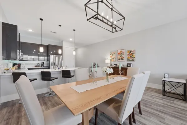 a view of a dining room with furniture