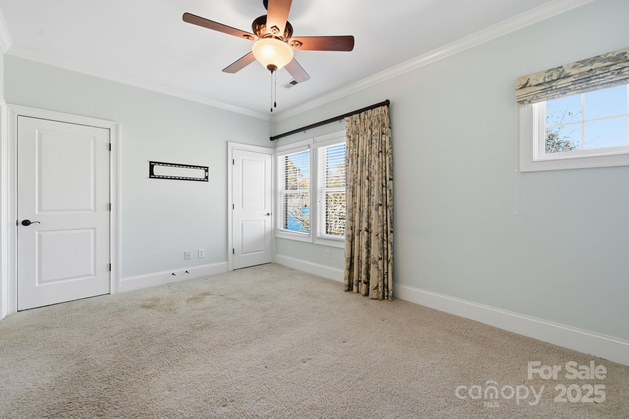 329 Spring Street Davidson, NC 28036 - Photo 12 of 31 a view of an empty room with a window
