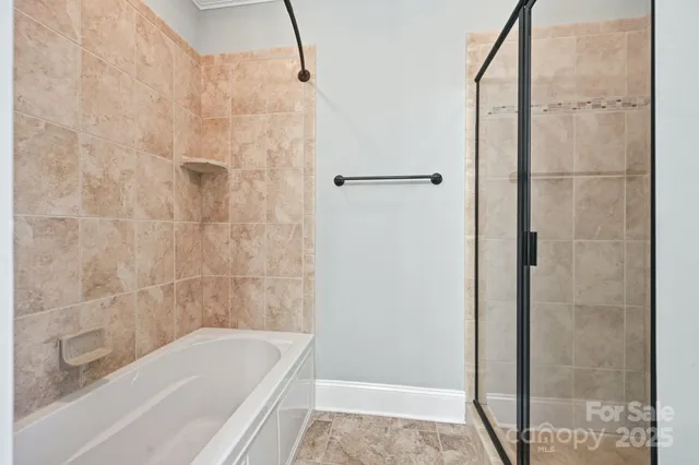 a bathroom with double vanity sink a vanity and a mirror