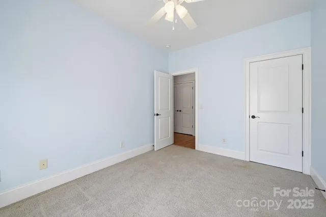 an empty room with a bathroom