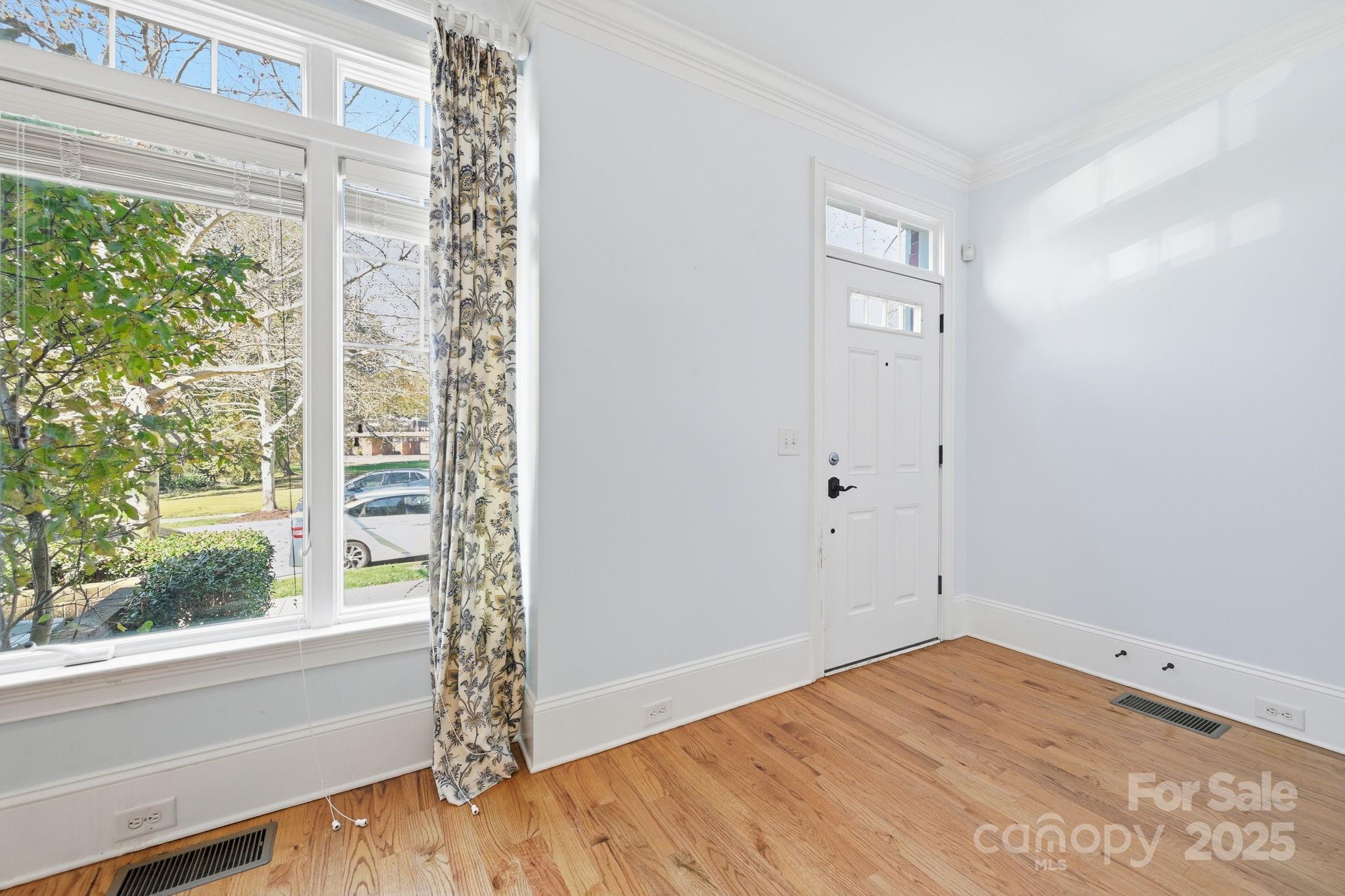 329 Spring Street Davidson, NC 28036 - Photo 3 of 31 a view of empty room with window
