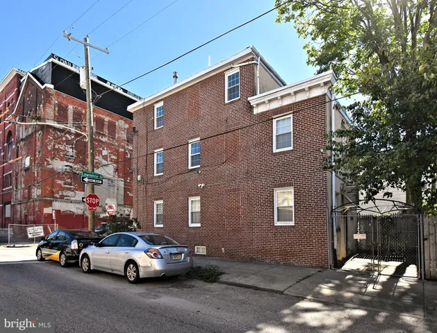 a car parked in front of a building