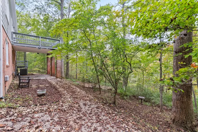 a backyard of a house with seating space