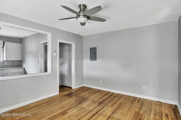 a front view of house with a garden and patio