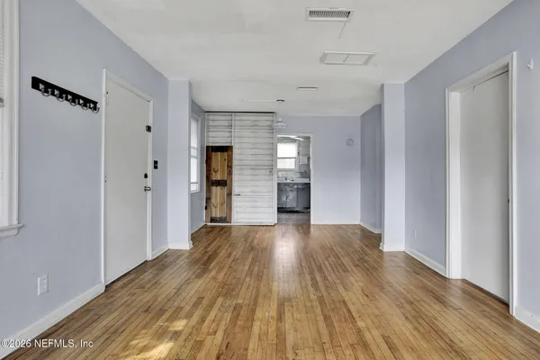 a kitchen with a stove and a microwave