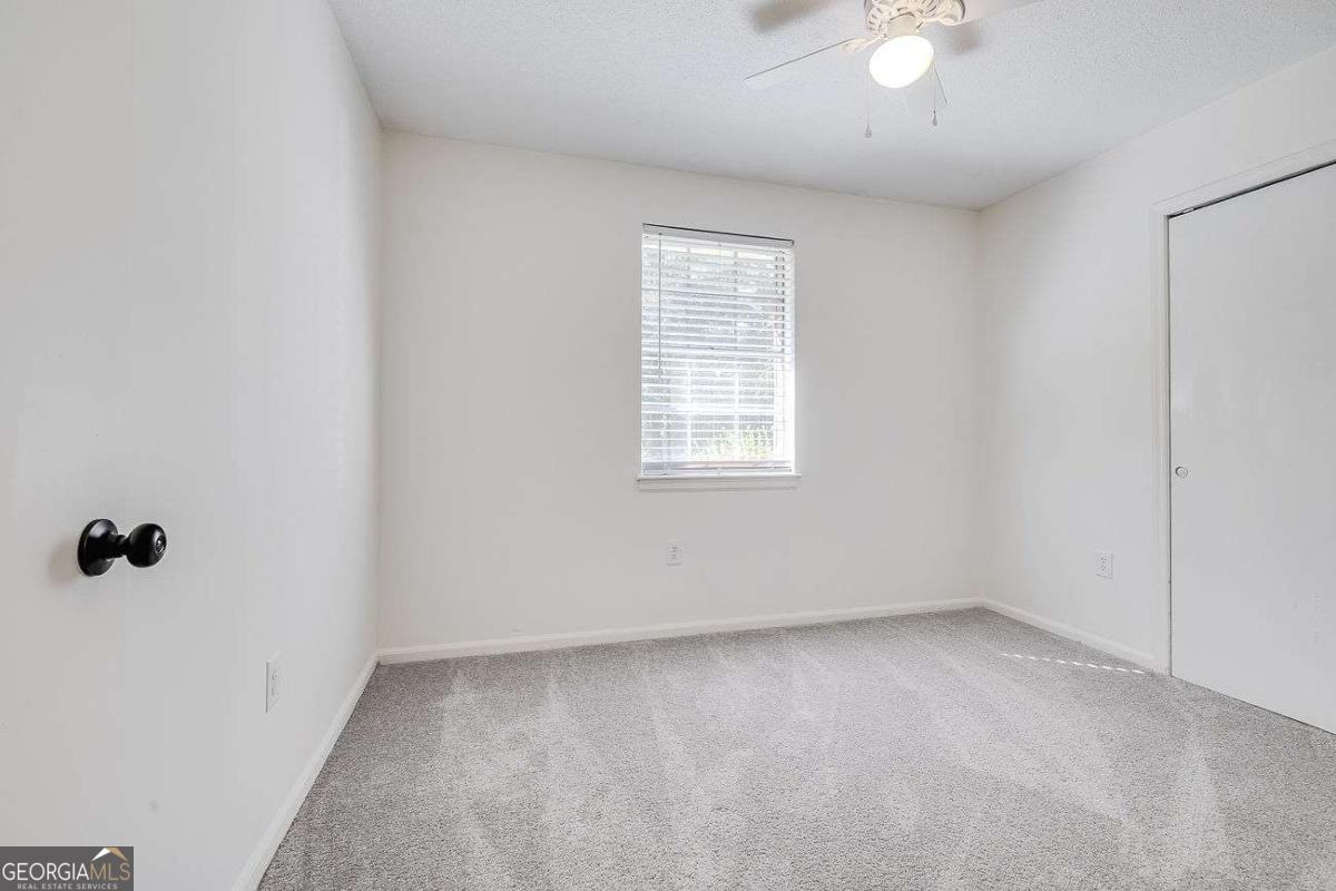 412 Rothwell Street Pooler, GA 31322 - Photo 25 of 32 an empty room with a window