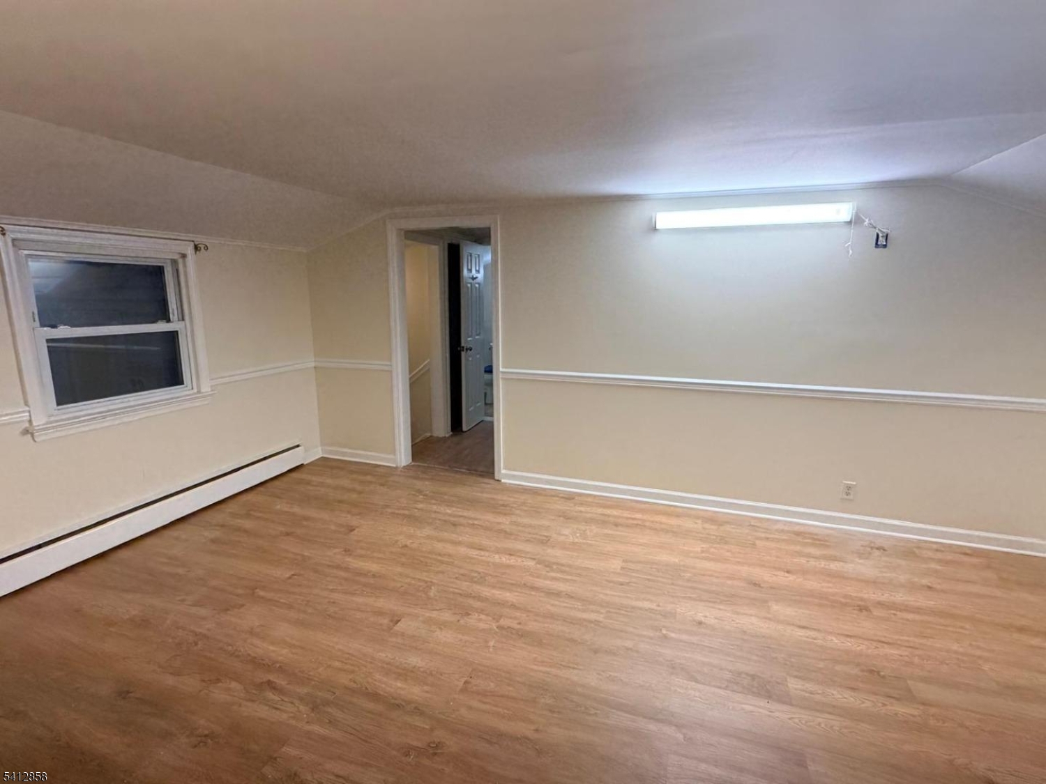 80 Allentown Road Parsippany, NJ 07054 - Photo 5 of 10 a view of an empty room with a fireplace and a window