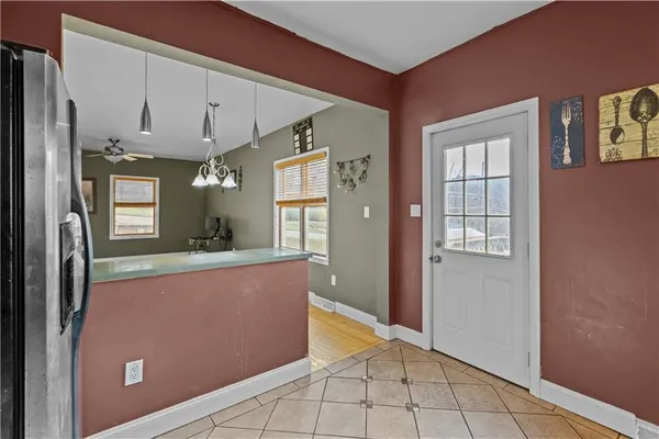 a bathroom with a tub and a shower