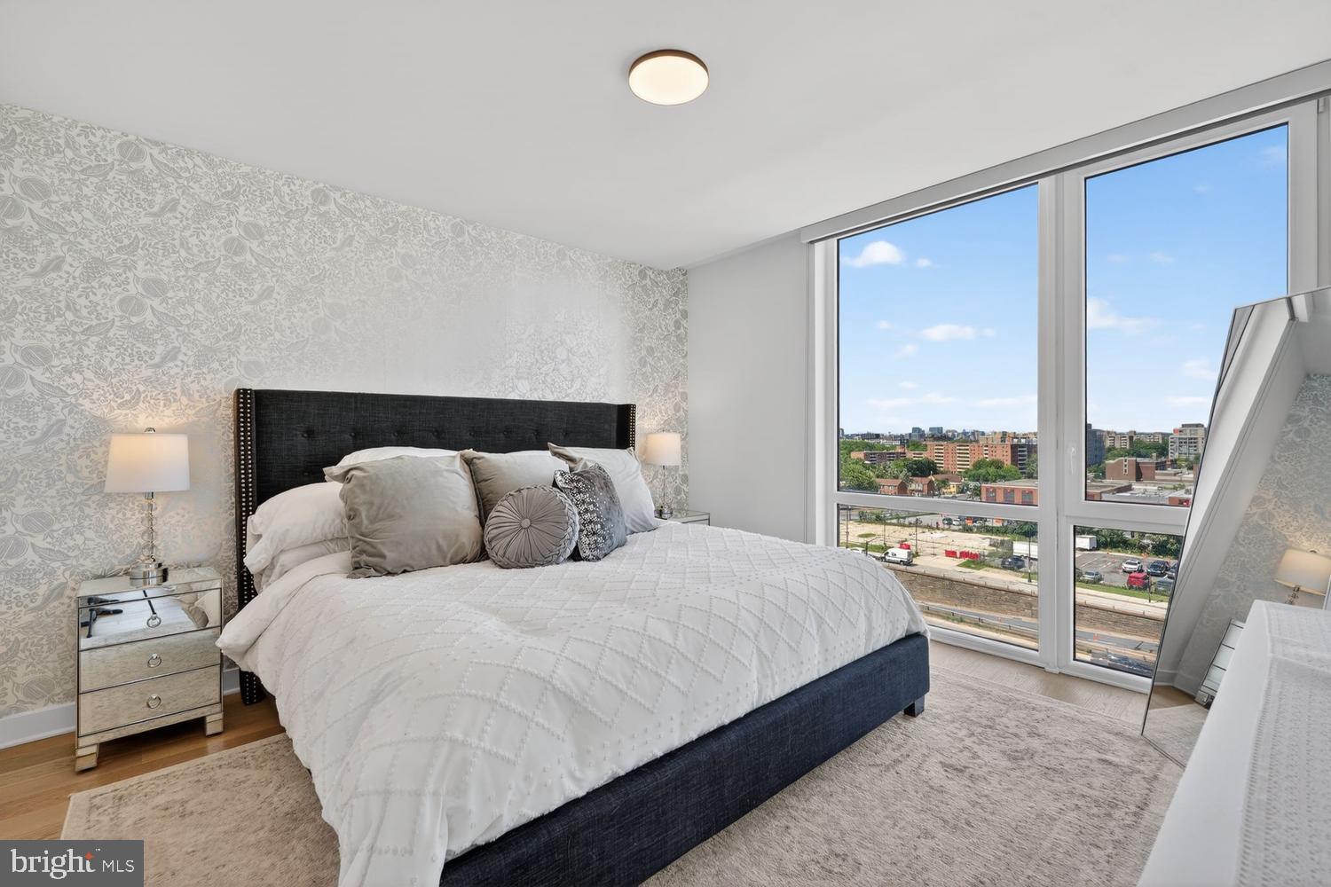 37 L Street Southeast, Unit 802 Washington, DC 20003 - Photo 8 of 23 a bedroom with a bed and window