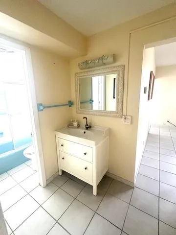 a bathroom with a toilet and a sink