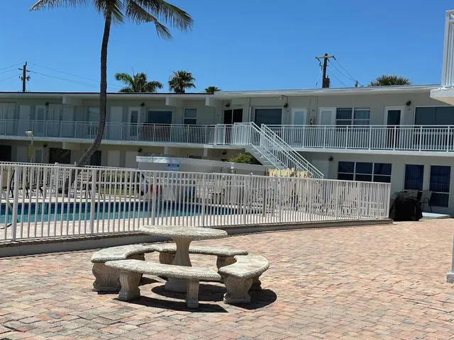 a front view of a house with swimming pool