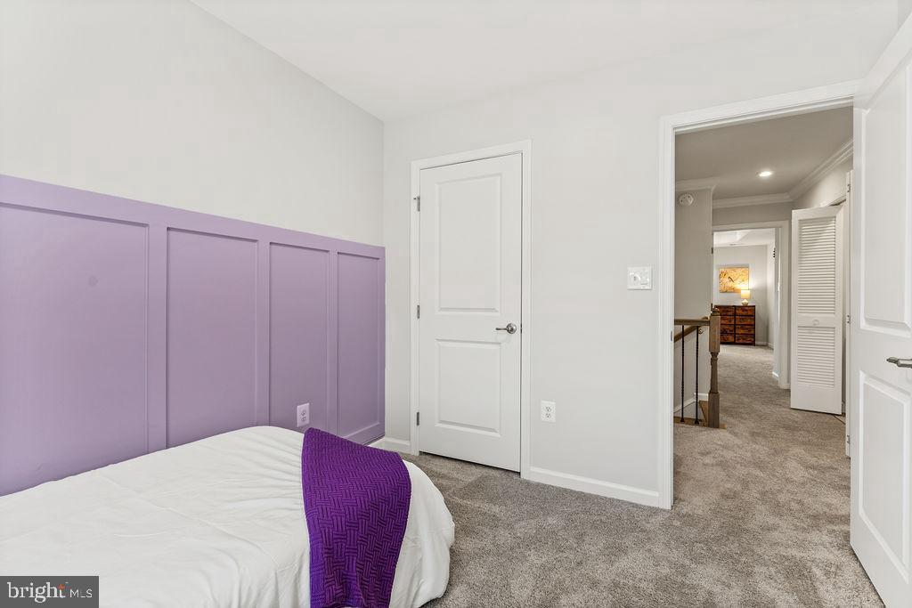 1008 Alum Road Fredericksburg, VA 22401 - Photo 30 of 43 Charming bedroom with a pop of purple.
