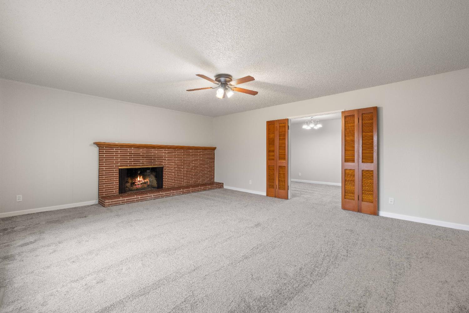 4907 Crestview Drive Carmichael, CA 95608 - Photo 19 of 33 a view of an empty room with a fireplace
