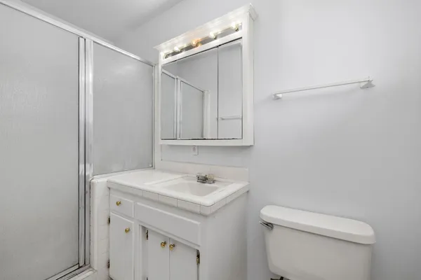 a bathroom with a sink and a toilet