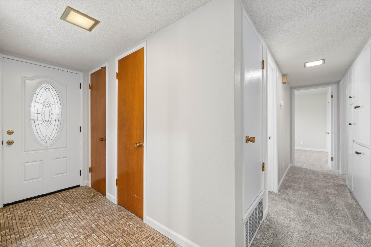 4907 Crestview Drive Carmichael, CA 95608 - Photo 33 of 33 a view of a hallway with windows and closet