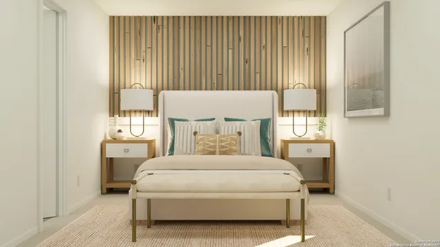 a bedroom with a bed lamp and a window