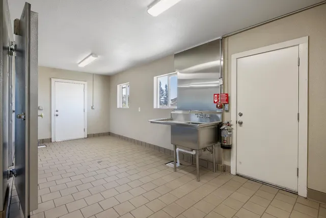 a bathroom with a toilet and shower