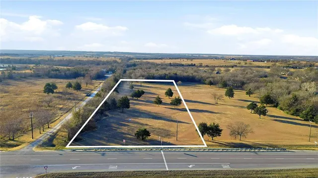 a view of a swimming pool with an ocean view
