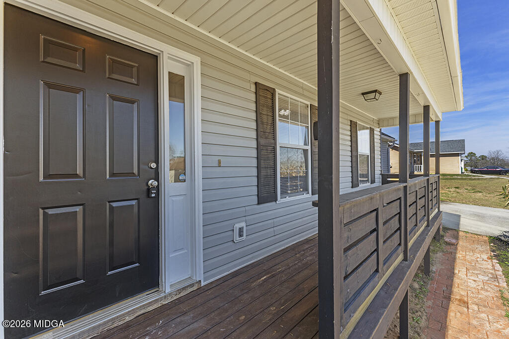 103 Echeconnee Ridge Road Warner Robins, GA 31093 - Photo 6 of 25 a view of a brick house with a large window