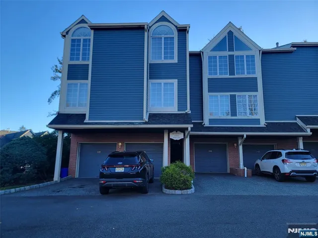 a car parked in front of a house