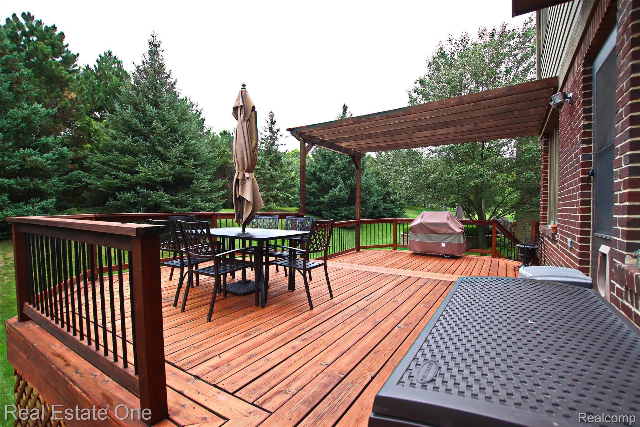 1272 Welland Drive Rochester, MI 48306 - Photo 45 of 53 Huge deck of the back; beautiful private setting