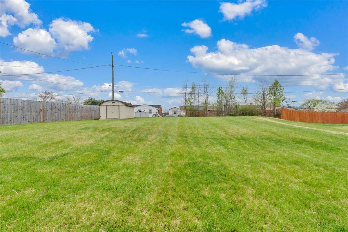 5156 Hazelridge Road Northwest Roanoke, VA 24012 - Photo 23 of 30 a view of a field of the house along with lots of trees