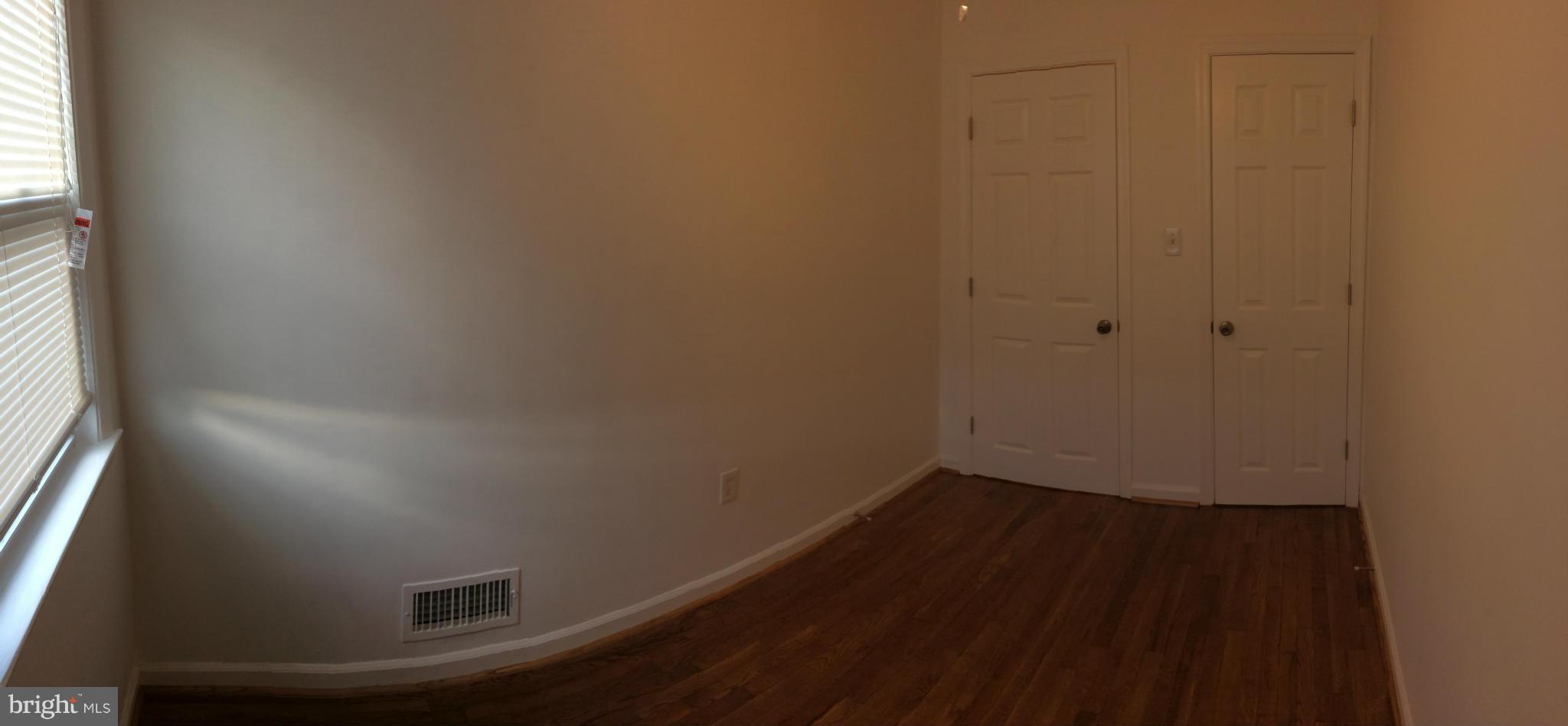 4415 Fenor Road Halethorpe, MD 21227 - Photo 20 of 29 a view of small space with wooden floor and windows