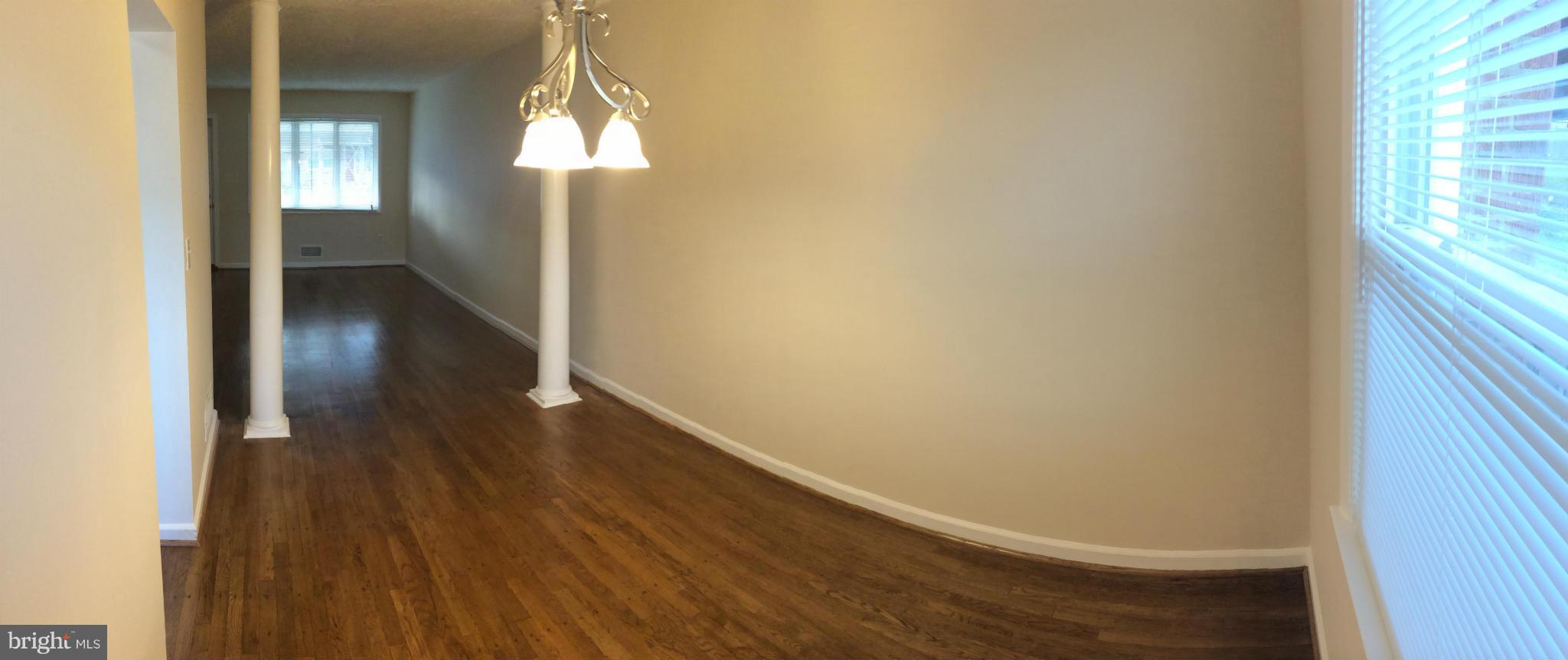 4415 Fenor Road Halethorpe, MD 21227 - Photo 10 of 29 a view of hallway with wooden floor
