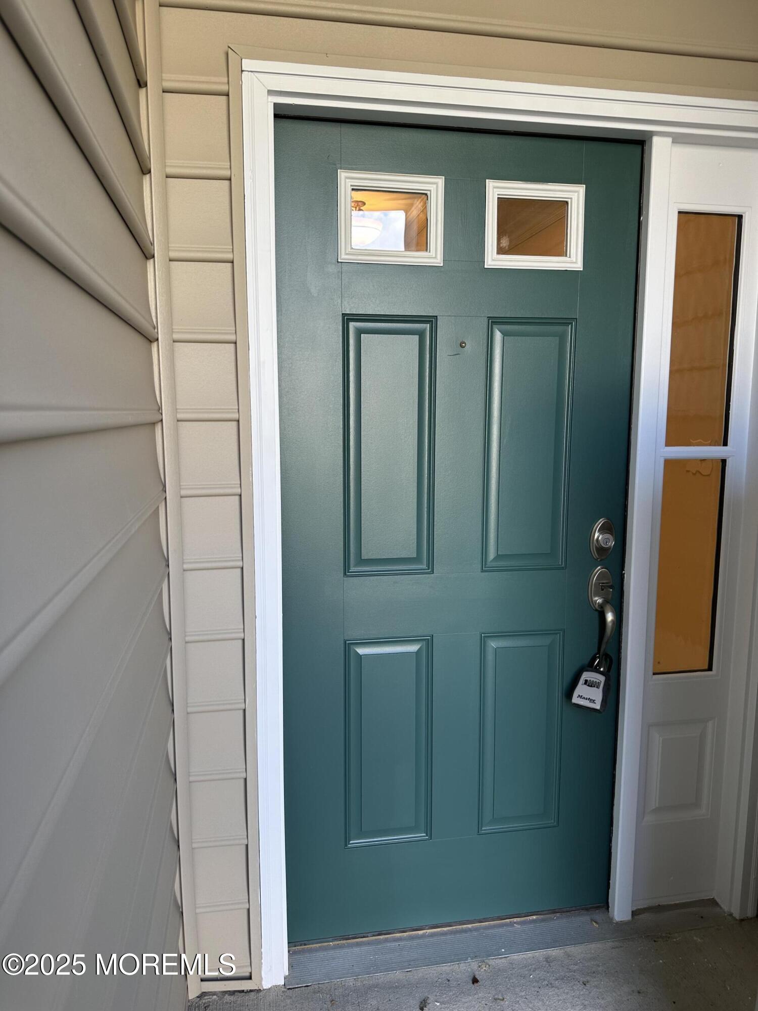 1006 Abby Road Middletown, NJ 07748 - Photo 2 of 36 a view of front door