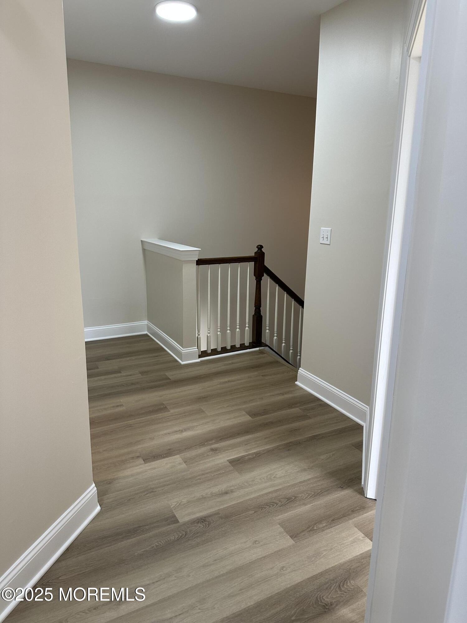 1006 Abby Road Middletown, NJ 07748 - Photo 29 of 36 a view of entryway with wooden floor