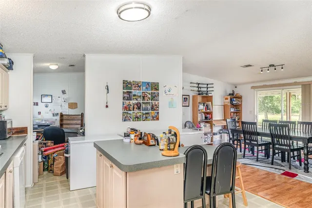 a view of a workspace with furniture and toys