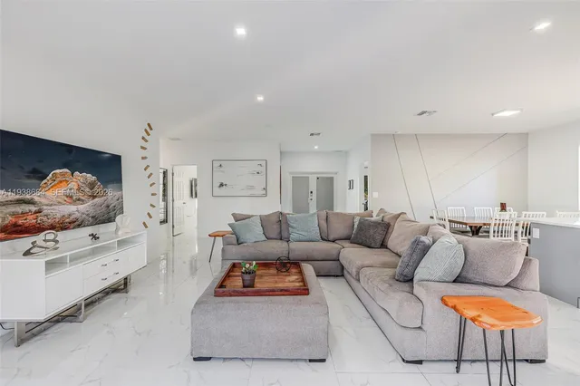 a living room with furniture and a couch