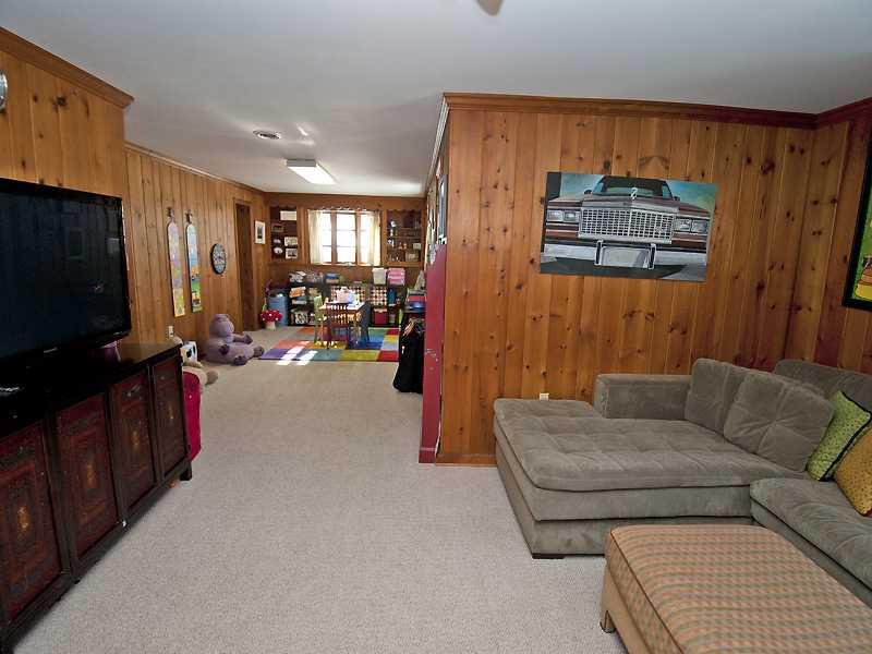 709 West Waldheim Road Fox Chapel, PA 15215 - Photo 13 of 18 Basement/Game Room. Finished basement game room - working fireplace and half bath! Plenty of space for a 4th bedroom.