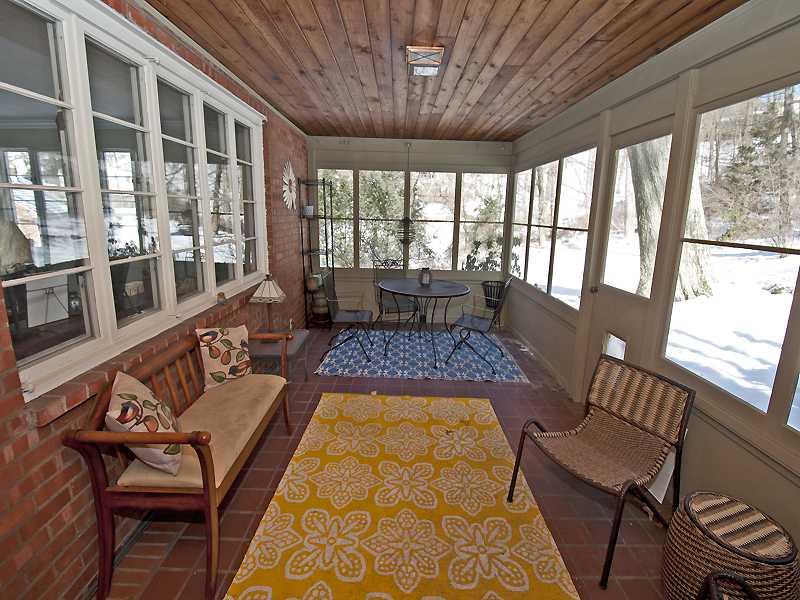709 West Waldheim Road Fox Chapel, PA 15215 - Photo 9 of 18 Sunroom. Screened in porch off of dining room overlooks back yard.
