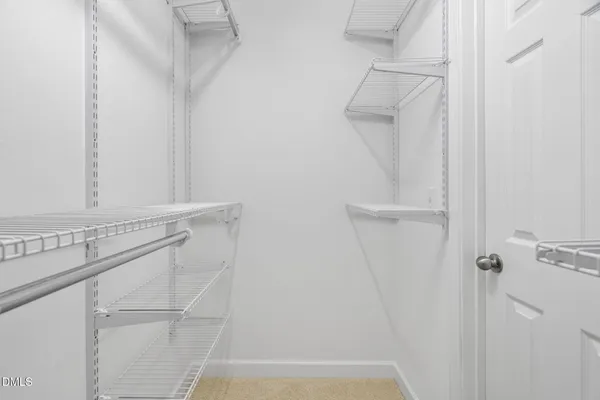 a white bath tub sitting next to a window