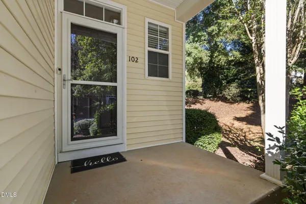 a view of a door and a window