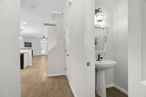 a kitchen with stainless steel appliances granite countertop a refrigerator a stove a sink and a microwave