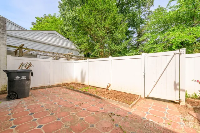 a view of a backyard of a house