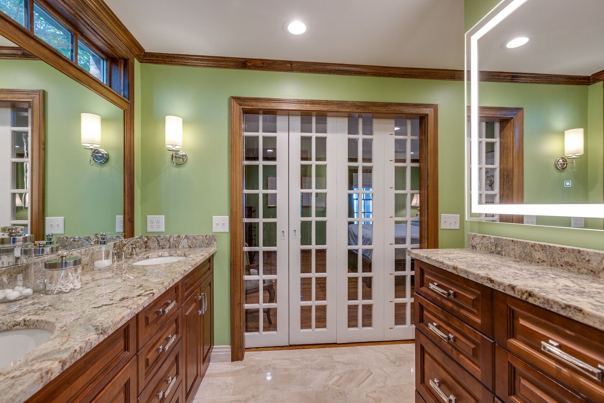 4248 Warren Road Franklin, TN 37067 - Photo 36 of 69 a bathroom with a granite countertop sink and a mirror