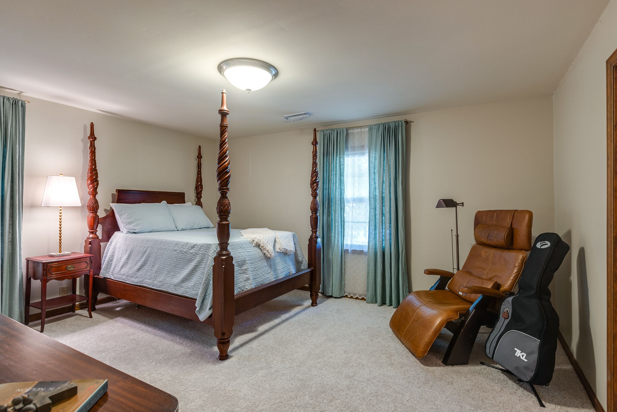 4248 Warren Road Franklin, TN 37067 - Photo 38 of 69 a bedroom with a bed and a mirror