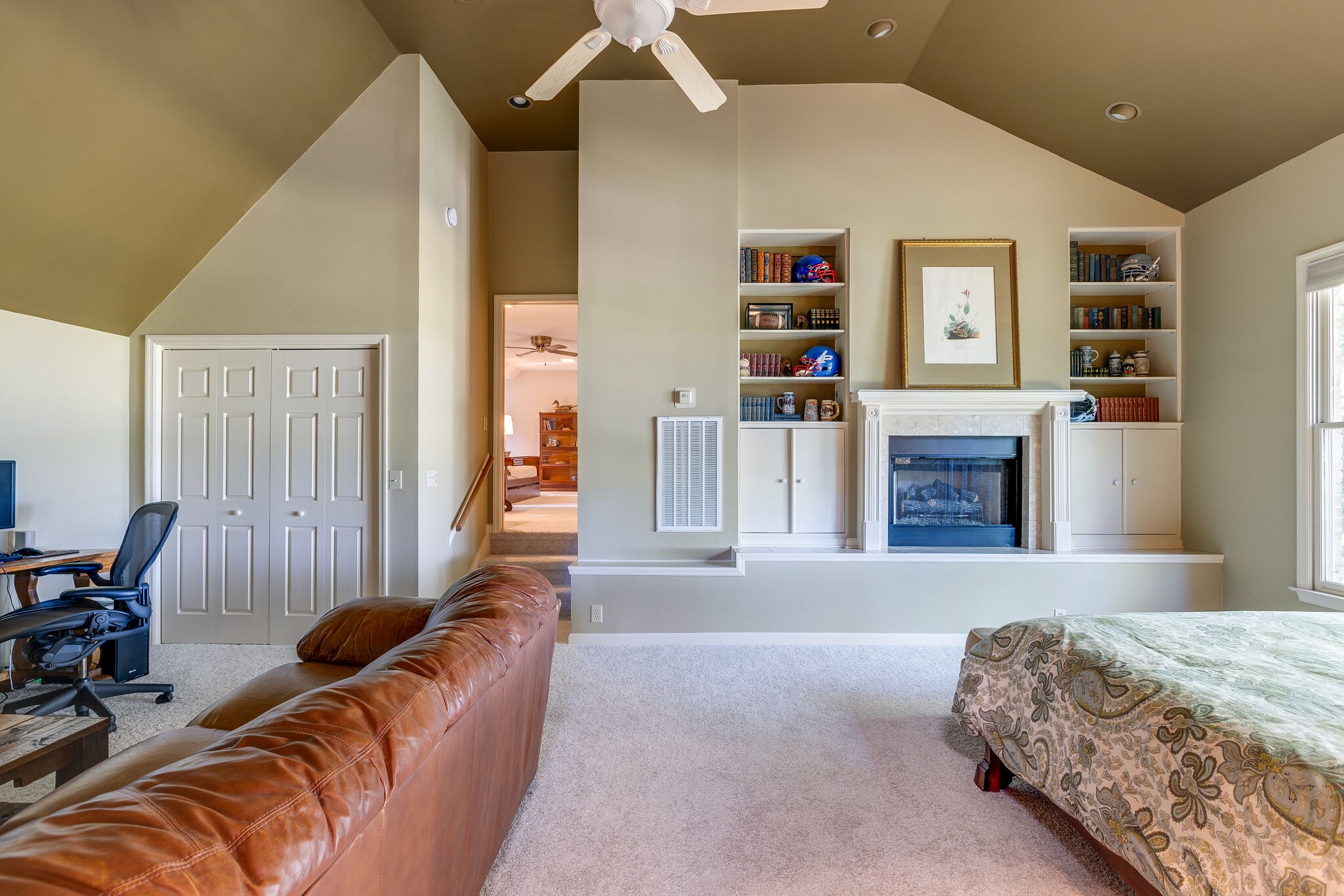4248 Warren Road Franklin, TN 37067 - Photo 48 of 69 a living room with furniture and a fireplace